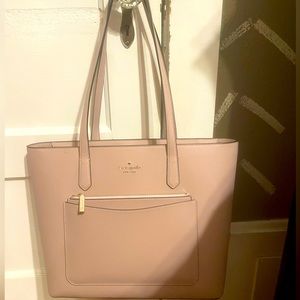 Kate spade bag with matching pouch.